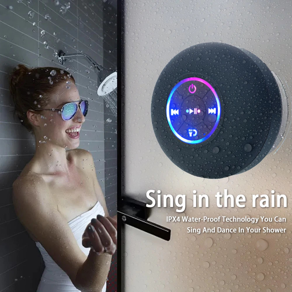 Bocina Bluetooth Portátil con LED e IPX4 – Impermeable, con Micrófono y Ventosa para Baño o Exterior