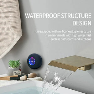 Bocina Bluetooth Portátil con LED e IPX4 – Impermeable, con Micrófono y Ventosa para Baño o Exterior